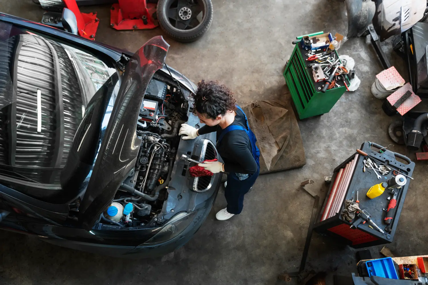 top-view-woman-repairing-car top-view-woman-repairing-car